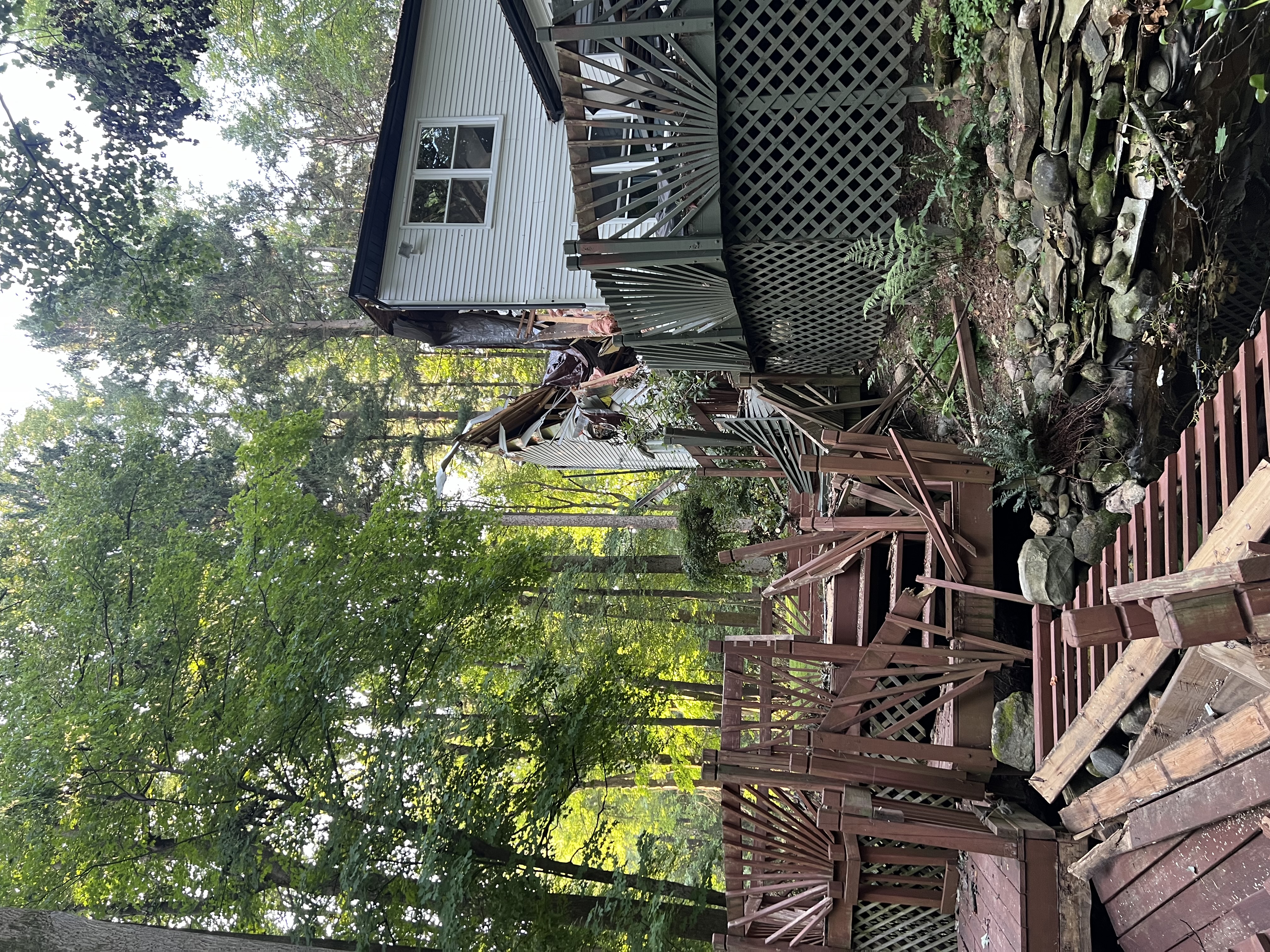 Luxury custom estate with metal roof, stone and board-and-batten facade — Skoda Construction, Northeast Ohio